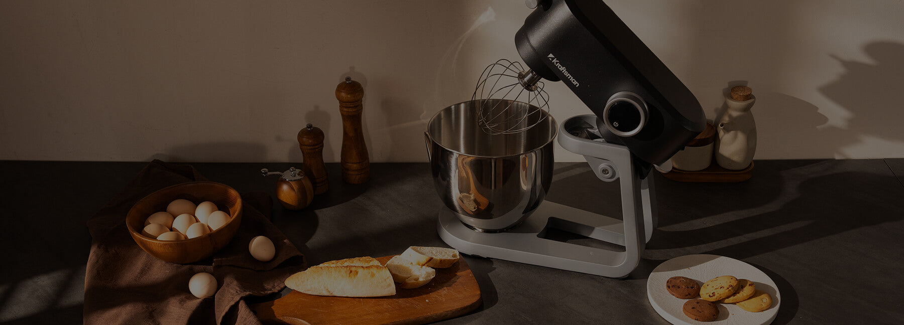 Kraftsman stand mixers arranged in a kitchen setting.
